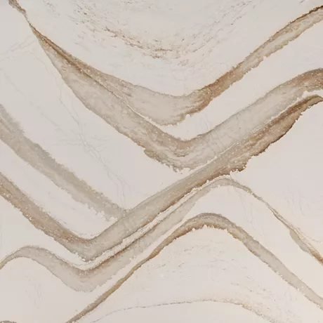 Brittanicca Gold Warm™ quartz by Cambria, a wave colorway