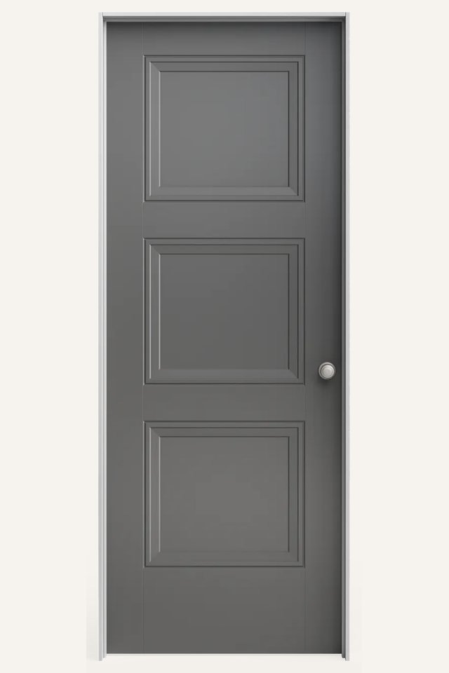 Frontal view of a closed interior 3 gray traditional panel door,with a silver round handle on the right side.
