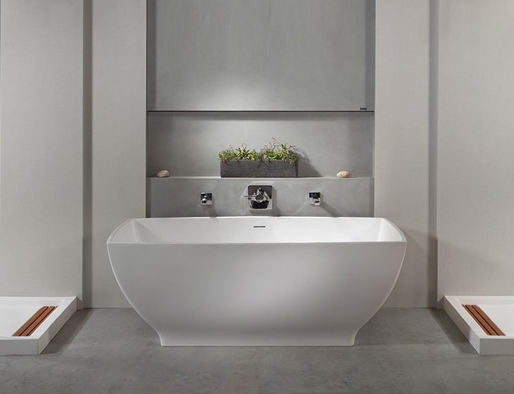 Adrian, a SculptureStone tub by MTI Baths