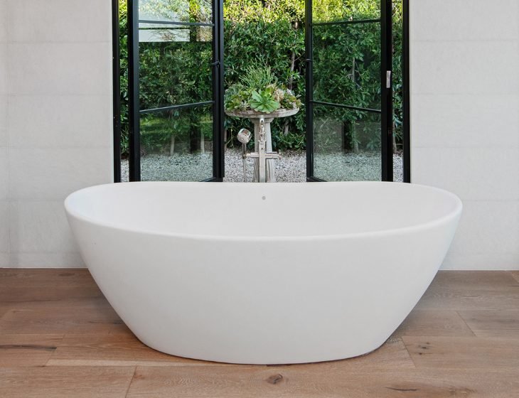 Elise, a SculptureStone tub by MTI Baths